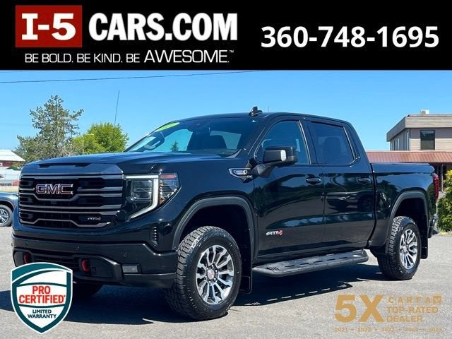 2022 GMC Sierra 1500 AT4 in Onyx Black — front three-quarter view