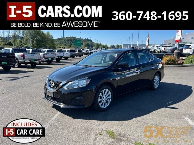 2018 Nissan Sentra SV in Black — front three-quarter view
