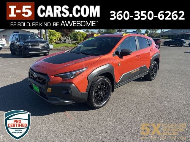 2024 Subaru Crosstrek Wilderness in Sun Blaze Pearl — front three-quarter view