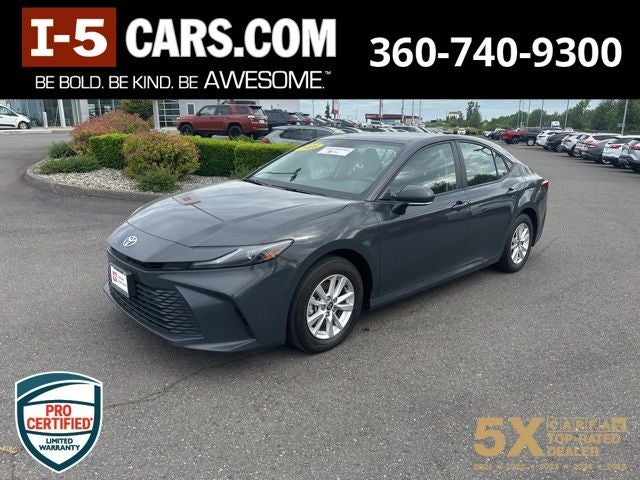 2025 Toyota Camry LE in Underground — front three-quarter view