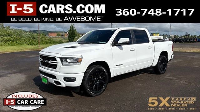 2023 RAM 1500 Laramie Crew Cab 4x4 5'7' Box in Bright White Clearcoat — front three-quarter view
