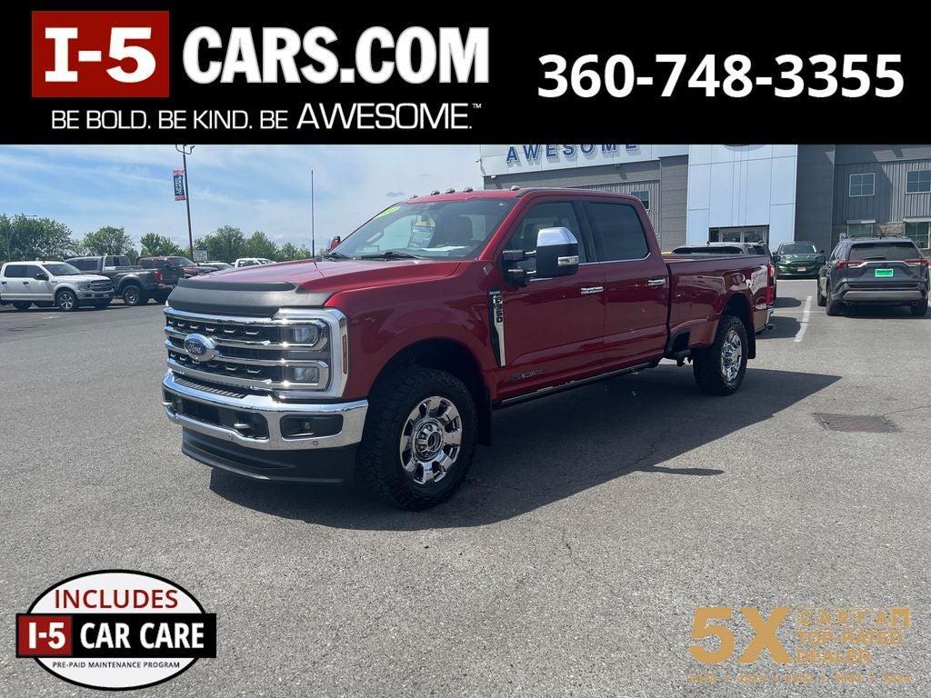 2024 Ford F-350SD King Ranch in Rapid Red Metallic Tinted Clearcoat — front three-quarter view