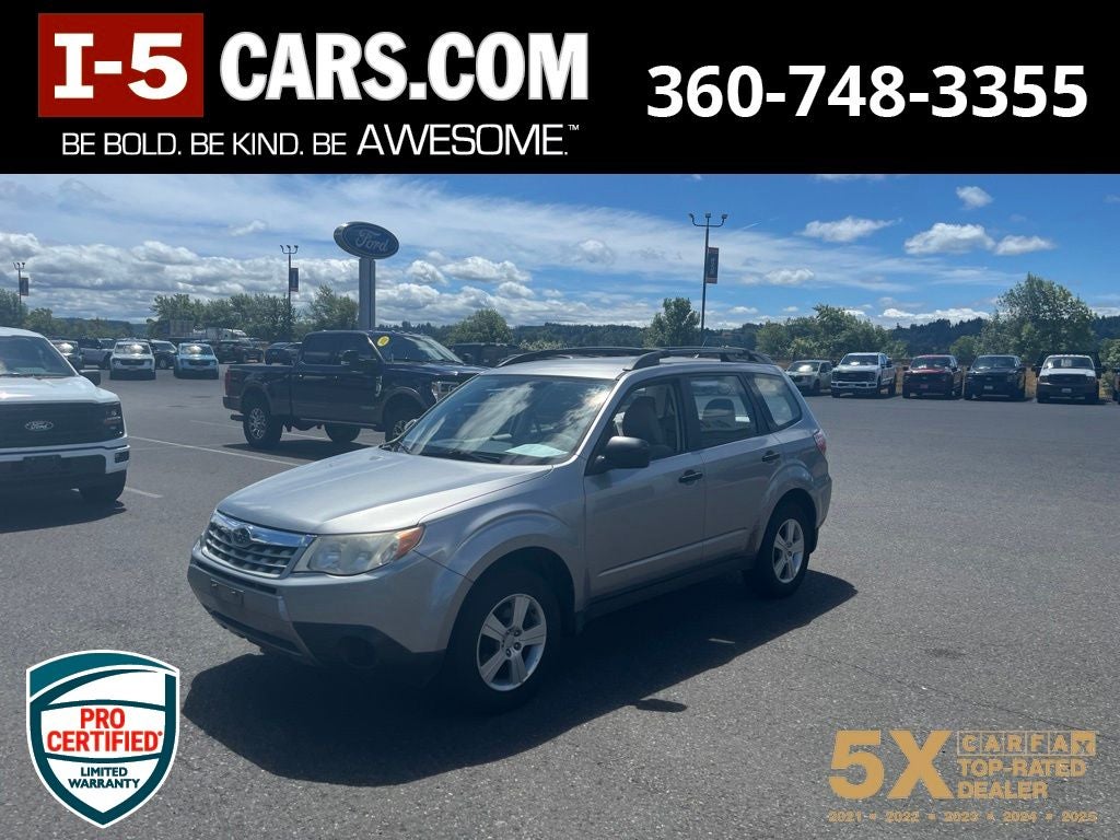 2011 Subaru Forester 2.5X in Steel Silver Metallic — front three-quarter view